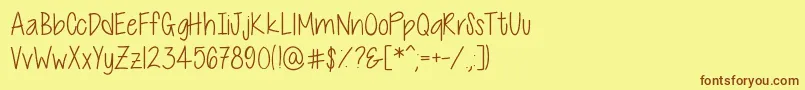 フォントCutiePatootieSkinny – 茶色の文字が黄色の背景にあります。
