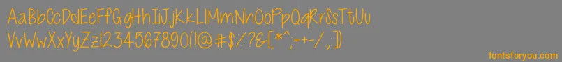 CutiePatootieSkinny Font – Orange Fonts on Gray Background