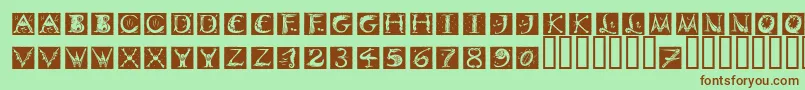 DinitialsNegativeItcTt-Schriftart – Braune Schriften auf grünem Hintergrund