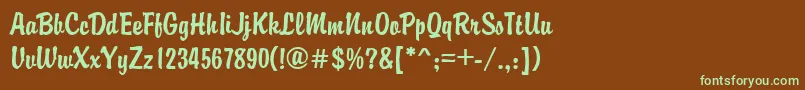 フォントGeBrandy – 緑色の文字が茶色の背景にあります。