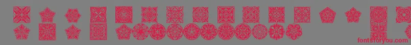 Prt Ornament5 Font – Red Fonts on Gray Background