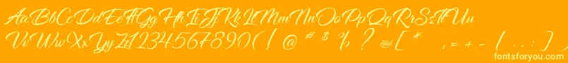 fuente DancingInTheRainbow – Fuentes Amarillas Sobre Fondo Naranja