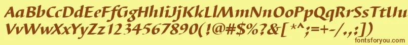 フォントBarbedortheaItalic – 茶色の文字が黄色の背景にあります。