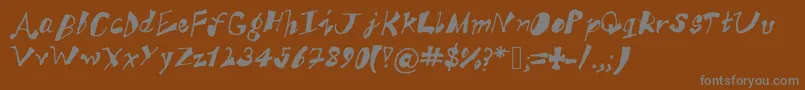 AkSFunkyTrunky Font – Gray Fonts on Brown Background