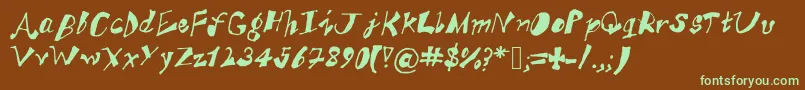 フォントAkSFunkyTrunky – 緑色の文字が茶色の背景にあります。