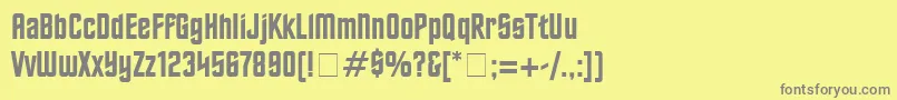 FinalFrontierOldStyle-fontti – harmaat kirjasimet keltaisella taustalla