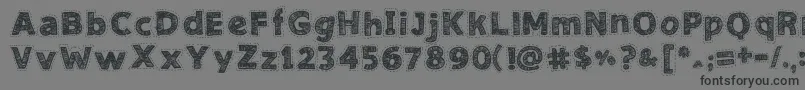 NeedleworkGood-fontti – mustat fontit harmaalla taustalla