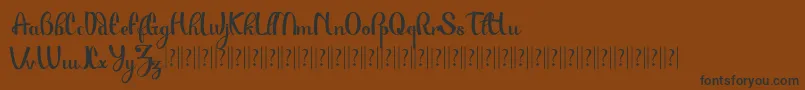 PauloPacito Font – Black Fonts on Brown Background