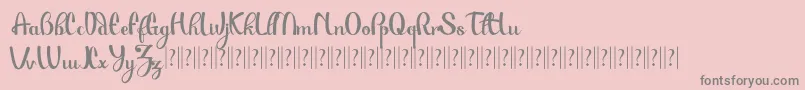 PauloPacito-Schriftart – Graue Schriften auf rosa Hintergrund