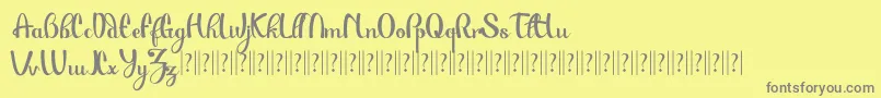 PauloPacito-Schriftart – Graue Schriften auf gelbem Hintergrund
