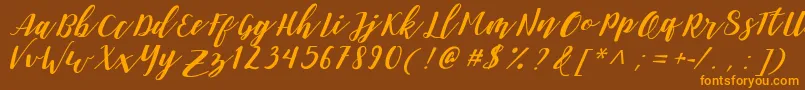 DanieshaForPersonalUse Font – Orange Fonts on Brown Background