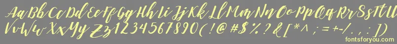 DanieshaForPersonalUse Font – Yellow Fonts on Gray Background