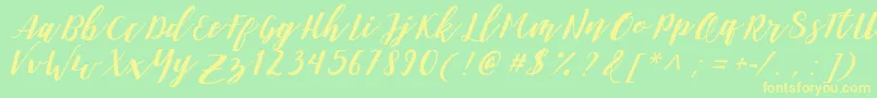 DanieshaForPersonalUse Font – Yellow Fonts on Green Background