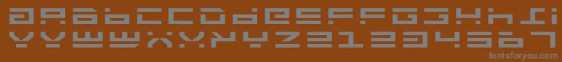 Шрифт RocketTypeExpanded – серые шрифты на коричневом фоне