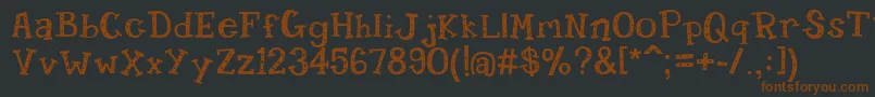 Candy Randy Font – Brown Fonts on Black Background