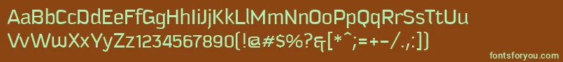 フォントKautiva – 緑色の文字が茶色の背景にあります。