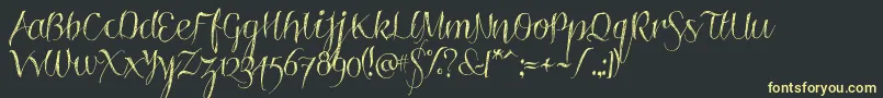 Roskrift Font – Yellow Fonts on Black Background