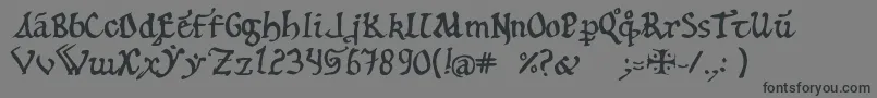 12thc.Abbey-Schriftart – Schwarze Schriften auf grauem Hintergrund