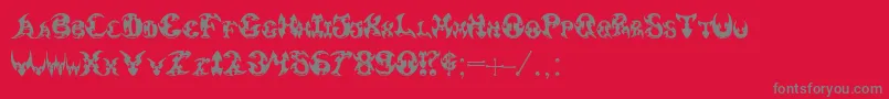 フォントPauls3DTribal – 赤い背景に灰色の文字