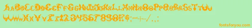 フォントPauls3DTribal – オレンジの文字が緑の背景にあります。