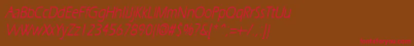 ErgoecondensedItalic Font – Red Fonts on Brown Background