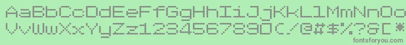 Dotimatrix7-fontti – harmaat kirjasimet vihreällä taustalla