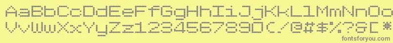フォントDotimatrix7 – 黄色の背景に灰色の文字