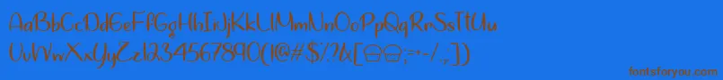 LetsBakeMuffinsTtf Font – Brown Fonts on Blue Background