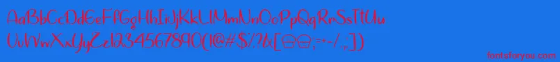 LetsBakeMuffinsTtf Font – Red Fonts on Blue Background