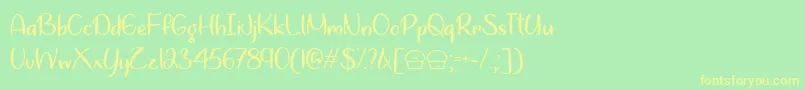 LetsBakeMuffinsTtf Font – Yellow Fonts on Green Background