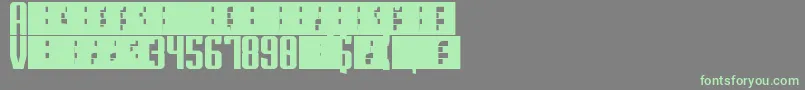 Шрифт Superguns – зелёные шрифты на сером фоне