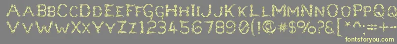 Lupusbl Font – Yellow Fonts on Gray Background