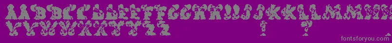 Lisätietoja CarolsRegular-fontista CarolsRegular-fontti – harmaat kirjasimet violetilla taustalla