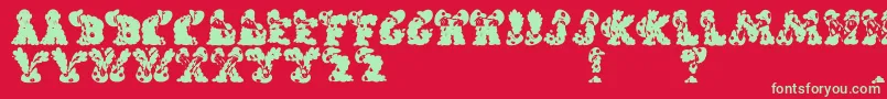 CarolsRegular Font – Green Fonts on Red Background