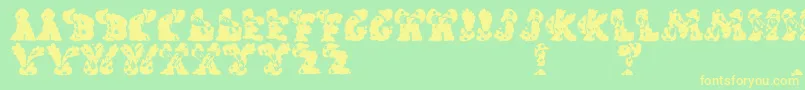 CarolsRegular-fontti – keltaiset fontit vihreällä taustalla