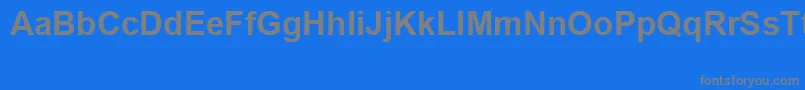 Czcionka ArialSpecialG1Bold – szare czcionki na niebieskim tle