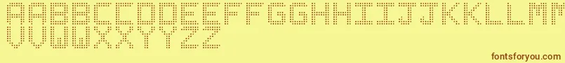 Шрифт LedizSt – коричневые шрифты на жёлтом фоне