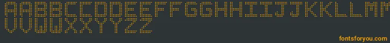 Czcionka LedizSt – pomarańczowe czcionki na czarnym tle