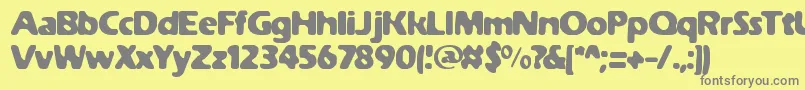 フォントWeatheredSolidBrk – 黄色の背景に灰色の文字