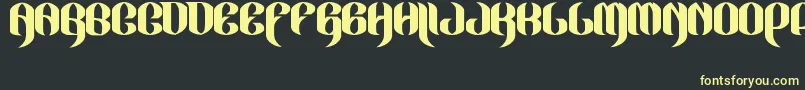 JakejarkorLocura Font – Yellow Fonts on Black Background