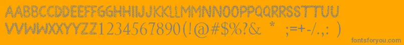 BlackEyePeas-Schriftart – Graue Schriften auf orangefarbenem Hintergrund