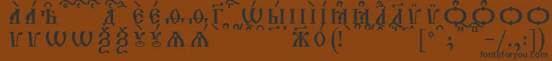 TriodionCapsKucsSpacedout-Schriftart – Schwarze Schriften auf braunem Hintergrund