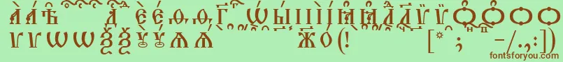 TriodionCapsKucsSpacedout-Schriftart – Braune Schriften auf grünem Hintergrund
