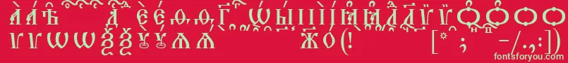 フォントTriodionCapsKucsSpacedout – 赤い背景に緑の文字