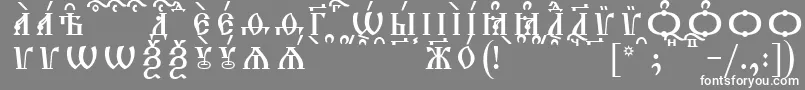 TriodionCapsKucsSpacedout-fontti – valkoiset fontit harmaalla taustalla