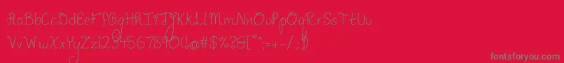 PineapplesDontHaveSleeves-Schriftart – Graue Schriften auf rotem Hintergrund