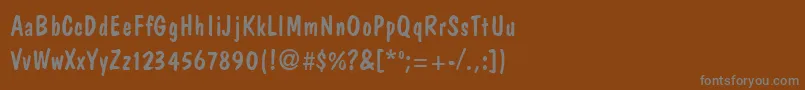 フォントDagiseaRegular – 茶色の背景に灰色の文字