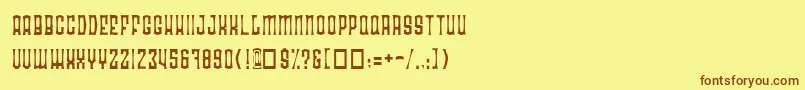 フォントRadoan – 茶色の文字が黄色の背景にあります。