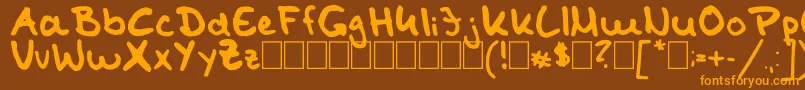 TomKaulitzHandwritingFontByShaiza7 Font – Orange Fonts on Brown Background