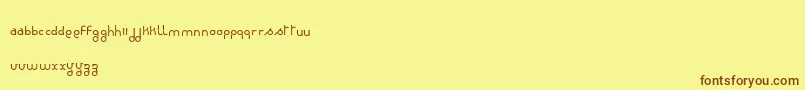 フォントRondieDker – 茶色の文字が黄色の背景にあります。